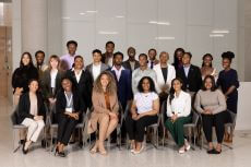 OTHC Students standing and sitting with white glossy background