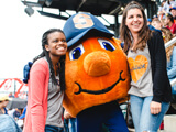 Photo: Alumni with Otto at Yankee Stadium