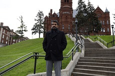 Saal Al Qahtani standing on campus