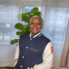 Gina Brown wearing muSUlife jacket