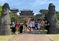 group of students pose at Jeju, South Korea