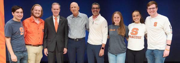 Chancellor Syverud and David B. Falk with Falk College Dean Jeremy Jordan and students at the Falk College of Sport Kickoff Celebration.