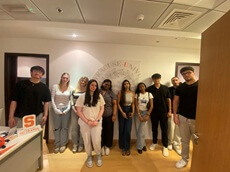 Syracuse incoming and current students group photo at SU Dubai office