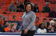 Coach Legette-Jack smiling on the court