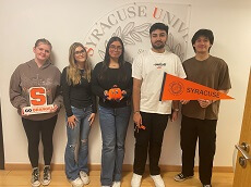 syracuse students pose at SU Dubai office