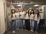 Six students from the Shaw Center's Nutrition Initiative stand in front of the Shaw Center