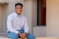 Garriel Prepetit OTHC Scholar and Engineering major posing for a portrait near Link Hall