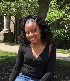 Raquell Carpenter Smiling on the quad