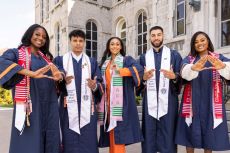 OTHC Seniors with graduation gowns and stolls