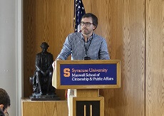 Ryan Monarch speaking at a conference