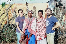 Suzanne Grant Lewis with People from Kenya pose for a picture