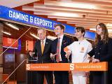 Chancellor Syverud and students at esports gaming center opening.