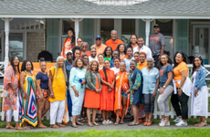 People in front of house