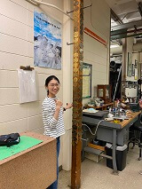 Mengqi Xu celebrating a successful dissertation by climbing Mrs. Jenning's leg.