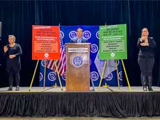 Grace Cogan provides Deaf interpretation in American Sign Language as County Executive Ryan McMahon delivers a daily briefing on COVID-19.