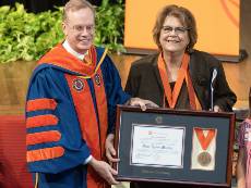 Chancellor Syverud and Falk College Dean Diane Lyden Murphy