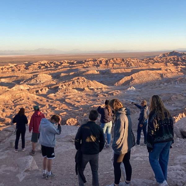 group of students standing on a desert in Santiago