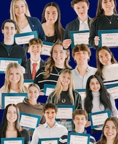 Students Holding Paper Signs